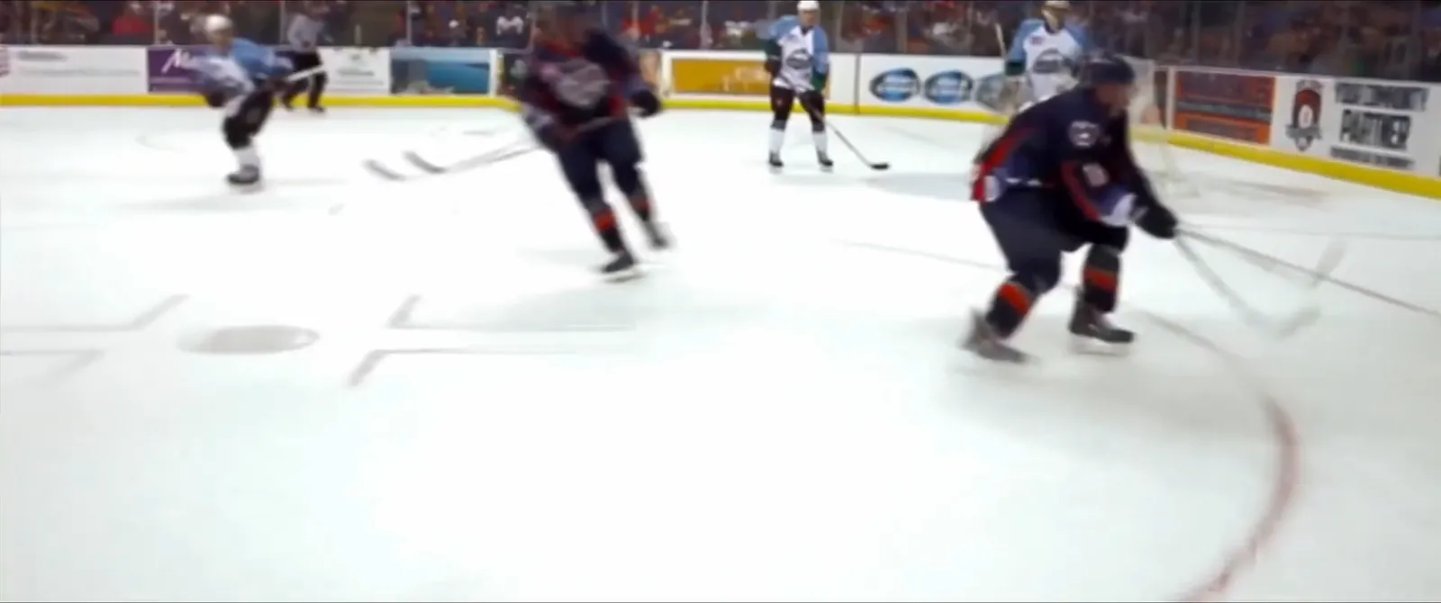 A hockey game on the ice inside Toyota Arena